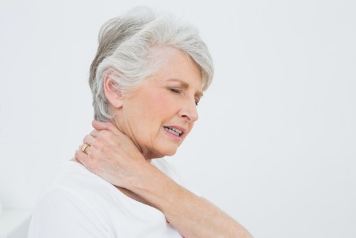 A woman with neck pain